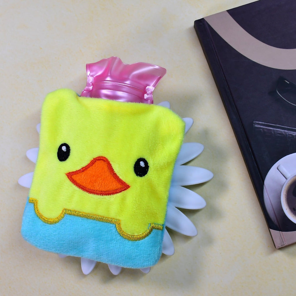 Cute yellow duck hot water bag with cover for neck pain relief.
